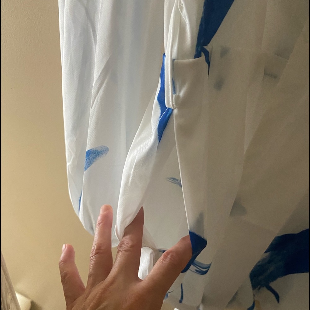 White with blue brush strokes Romper.